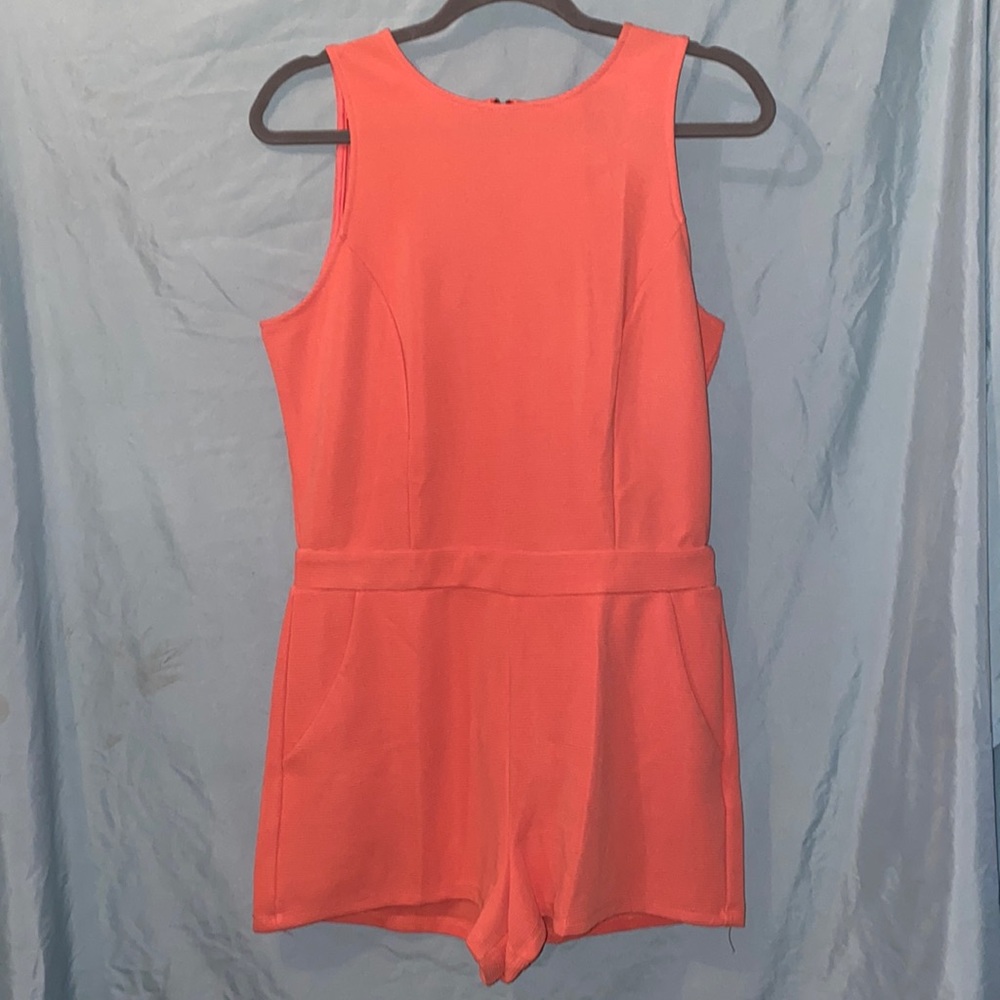 Coral Romper - front pockets